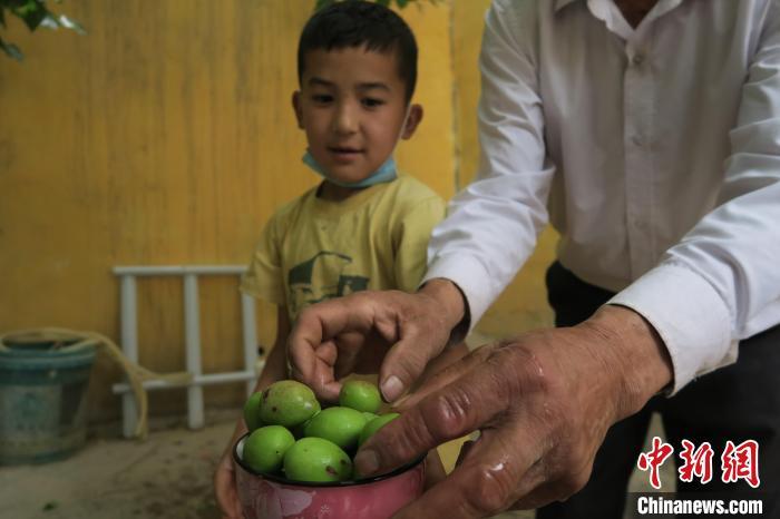 圖為進(jìn)藏先遣英雄連誓師地原址所在的新疆維吾爾自治區(qū)和田地區(qū)于田縣普魯村現(xiàn)貌?！畛坛?攝