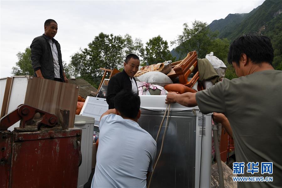 （新華全媒+）（9）千里“挪窩”，踏實(shí)開啟新生活