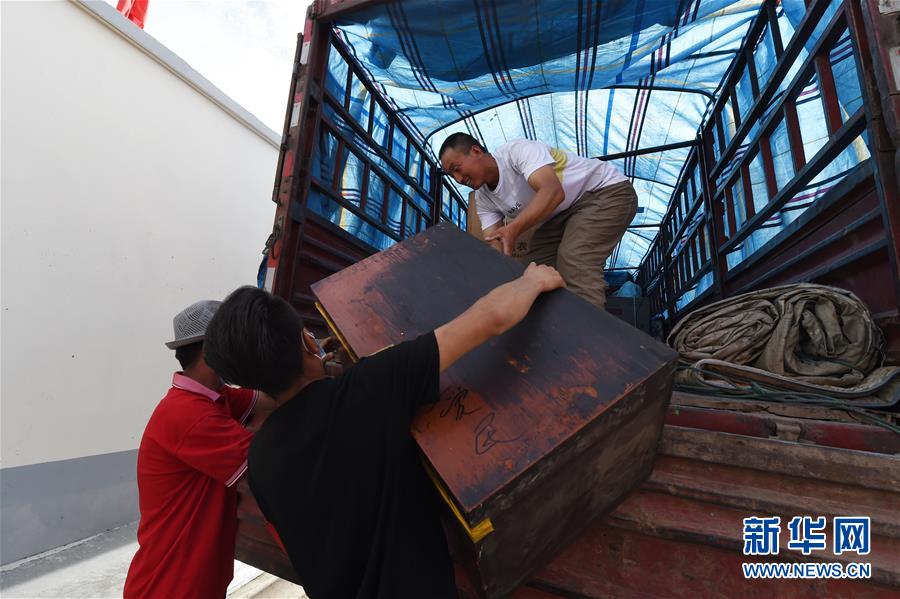 （新華全媒+）（26）千里“挪窩”，踏實(shí)開啟新生活